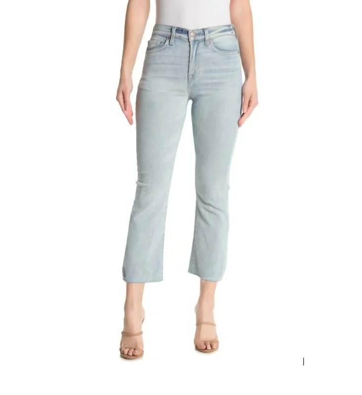 women's distressed high-waisted denim -High Rise Kick Flare Raw Hem Jeans In Light Blue