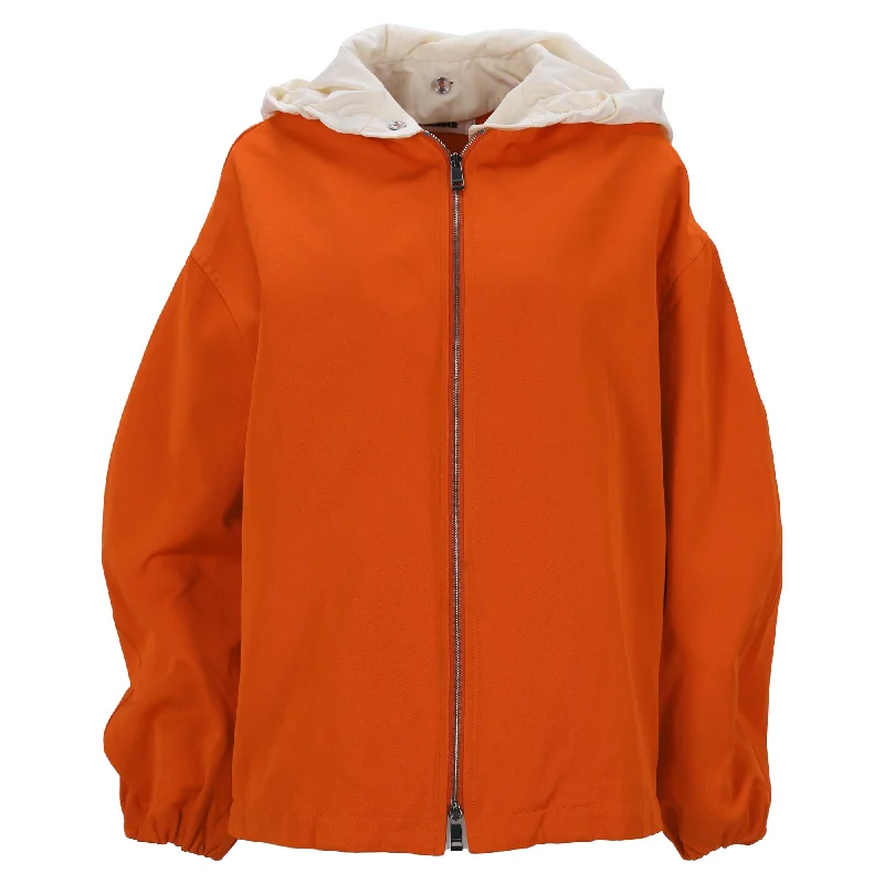 urban style cropped puffer jacket -Jil Sander Two-Toned Double Zipper Hooded Jacket in Orange Polyamide